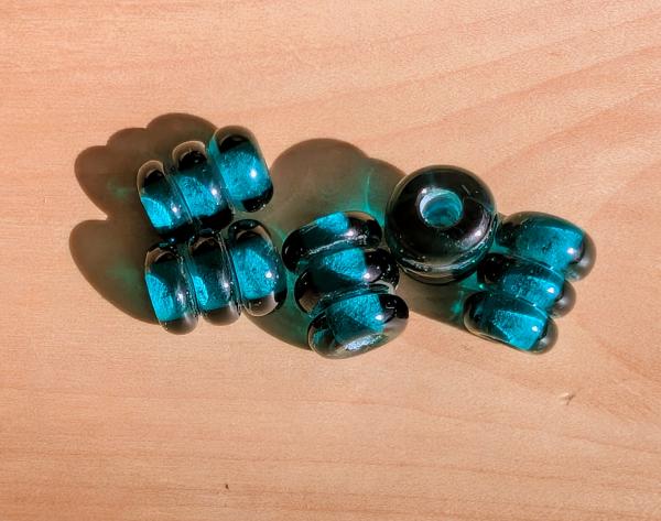 Glass bead Haithabu petrol green segment bead